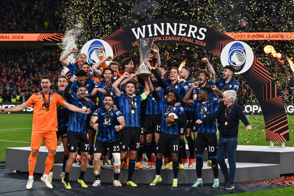 Atalanta players and manager celebrating their historical win in the Europa League in 2024